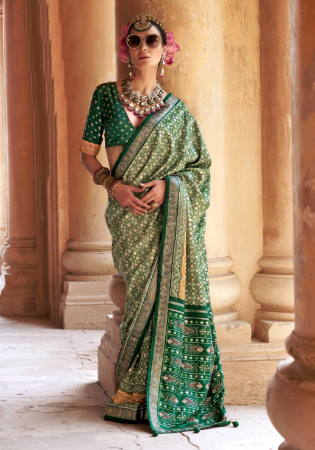 Picture of Shapely Silk Dark Olive Green Saree