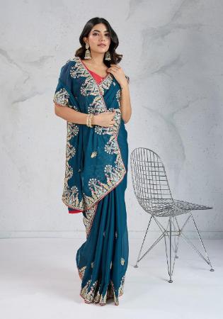 Picture of Bewitching Georgette & Silk Teal Saree